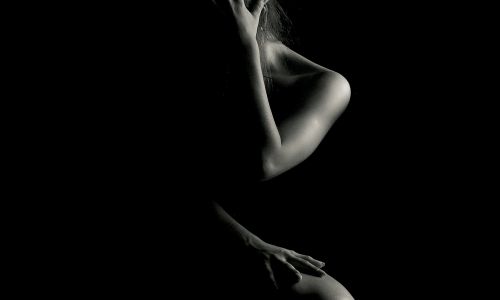 Woman posing on black background art class sunshine coast