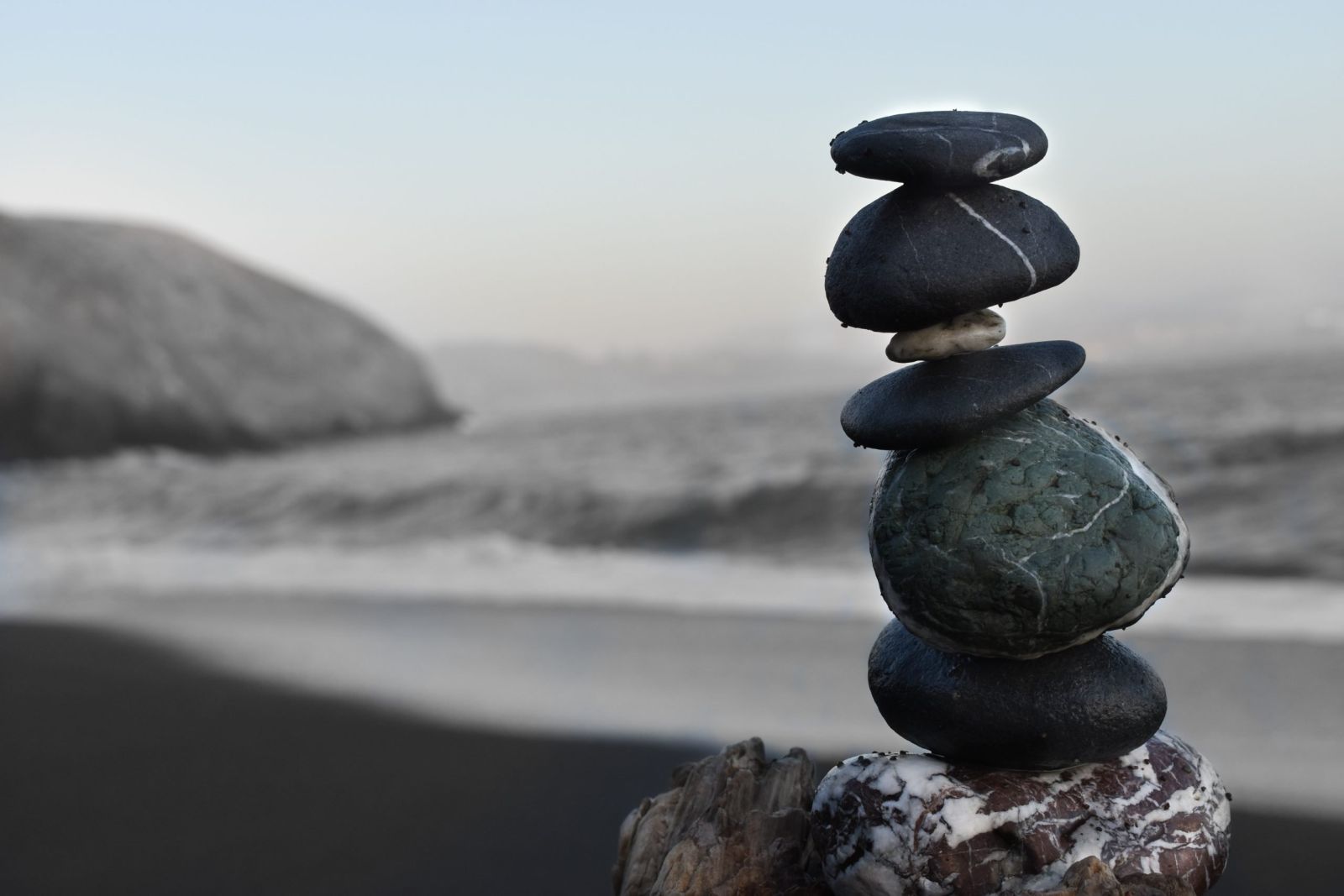 Rocks stacked by ocean Sunshine Coast Artist