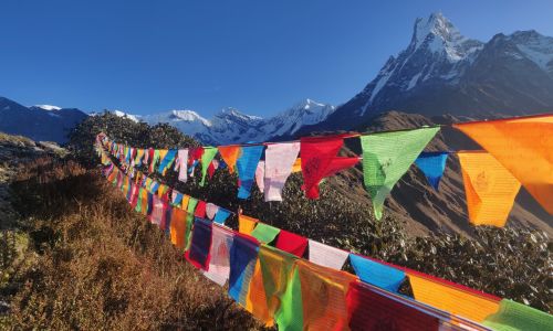 prayer flags overlooking mountain